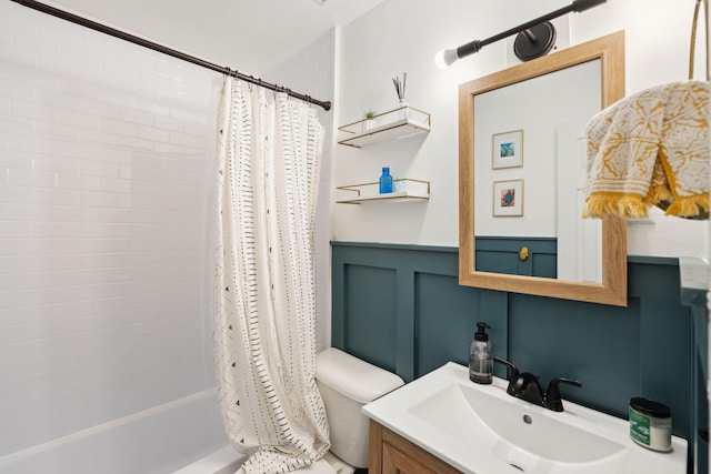 bathroom featuring shower / tub combo and vanity