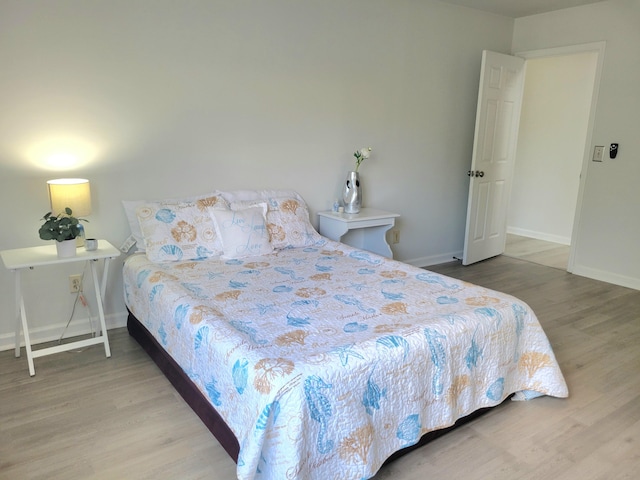 4457 Rice Mill Dr, North Charleston, SC 29420 - bedroom featuring wood finished floors and baseboards