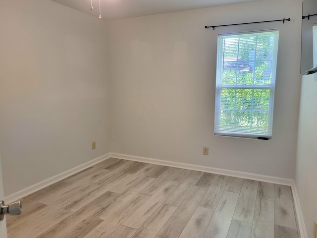 4457 Rice Mill Dr, North Charleston, SC 29420 - spare room featuring light wood-type flooring and baseboards