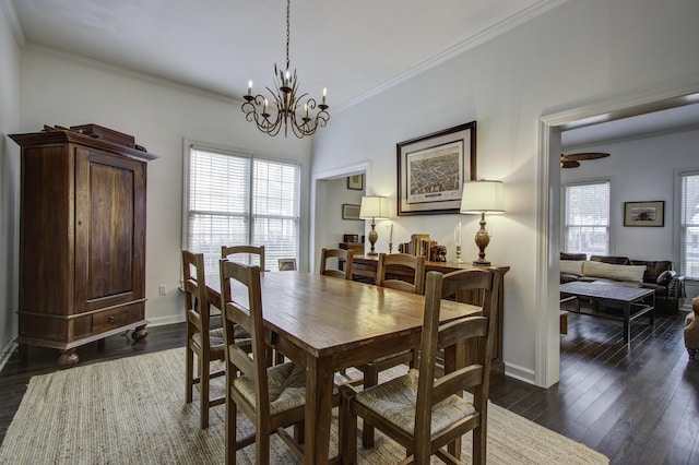 dining space with dark hardwood / wood-style flooring, a notable chandelier, ornamental molding, and a healthy amount of sunlight