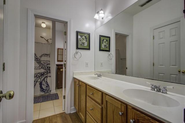 bathroom featuring vanity and tile patterned floors