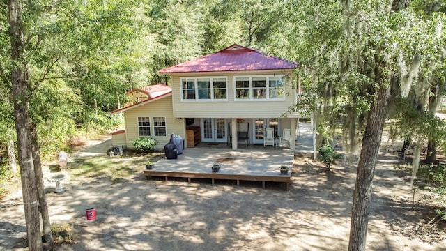 rear view of house with a deck