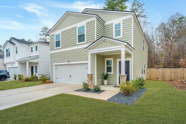 view of front of property featuring a garage and a front lawn