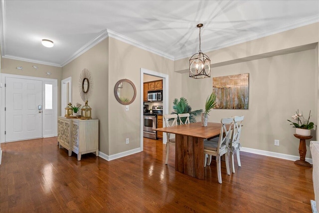 dining room featuring an inviting chandelier, crown molding, and dark wood-type flooring