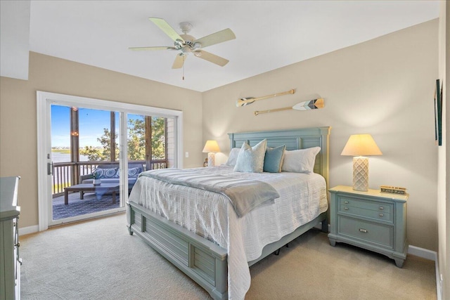 carpeted bedroom featuring access to exterior and ceiling fan