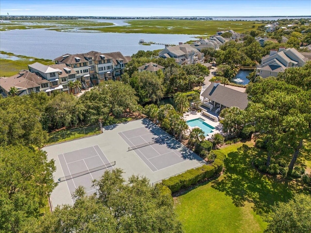 birds eye view of property with a water view