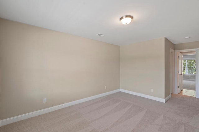 empty room with carpet flooring