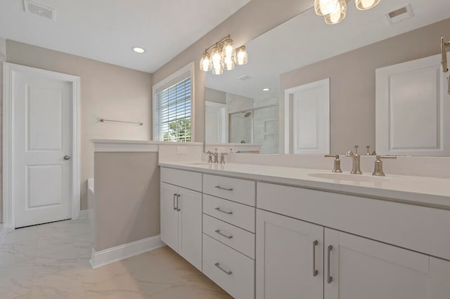 full bath featuring marble finish floor, double vanity, visible vents, a sink, and a shower stall