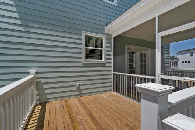 wooden deck with french doors