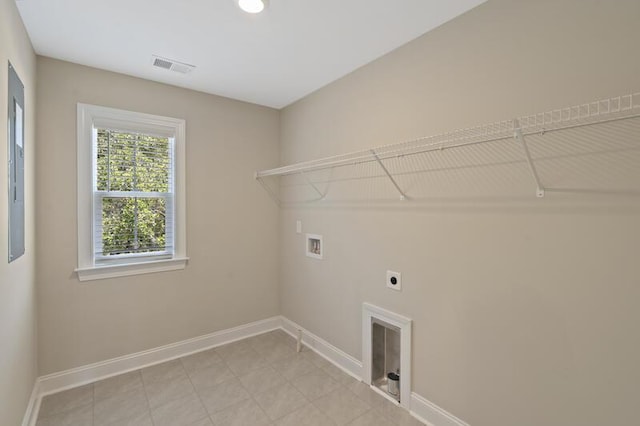 clothes washing area featuring hookup for a washing machine, laundry area, visible vents, baseboards, and electric dryer hookup