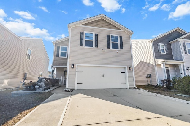 view of front facade featuring driveway and an attached garage