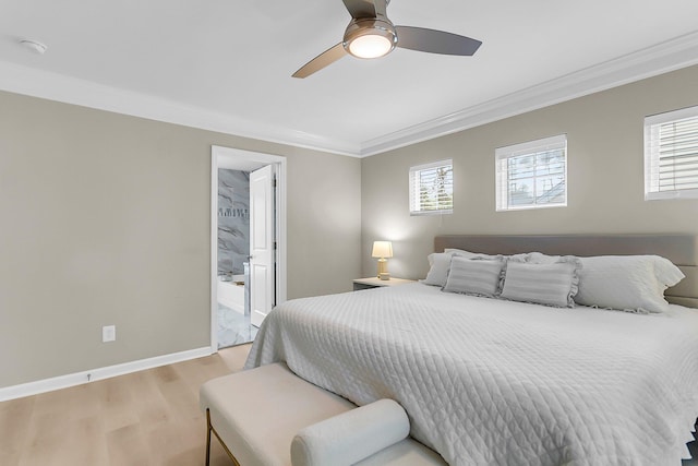 bedroom with baseboards, ornamental molding, multiple windows, and light wood-style flooring