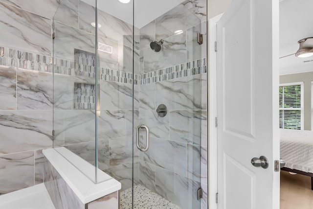ensuite bathroom featuring connected bathroom and a stall shower