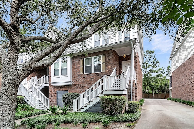 622 Windermere Blvd Unit D, Charleston, SC 29407 - view of front facade with stairway and brick siding