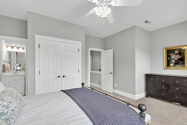 622 Windermere Blvd Unit D, Charleston, SC 29407 - bedroom with light carpet, a closet, baseboards, ceiling fan, and ensuite bathroom
