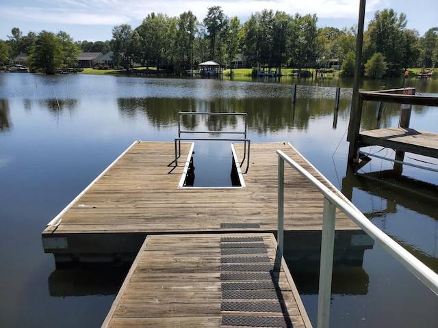 dock area featuring a water view