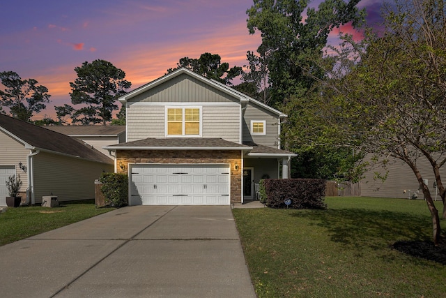 1723 Indaba Way, Charleston, SC 29414 - traditional home featuring concrete driveway, an attached garage, a front lawn, and stone siding