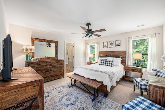 1723 Indaba Way, Charleston, SC 29414 - bedroom with light colored carpet, multiple windows, and ceiling fan