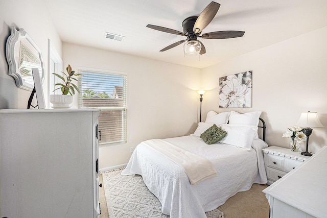 1723 Indaba Way, Charleston, SC 29414 - bedroom with light carpet, ceiling fan, and baseboards