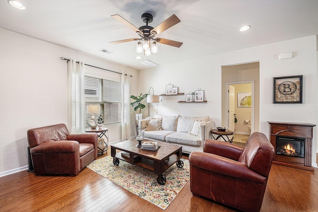 1723 Indaba Way, Charleston, SC 29414 - living room with hardwood / wood-style floors, recessed lighting, a ceiling fan, baseboards, and a glass covered fireplace