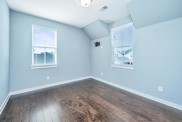 415 Watergrass Way, Summerville, SC 29485 - additional living space with dark wood-type flooring, baseboards, vaulted ceiling, and visible vents