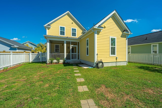 415 Watergrass Way, Summerville, SC 29485 - back of house featuring a sunroom, a yard, and a fenced backyard