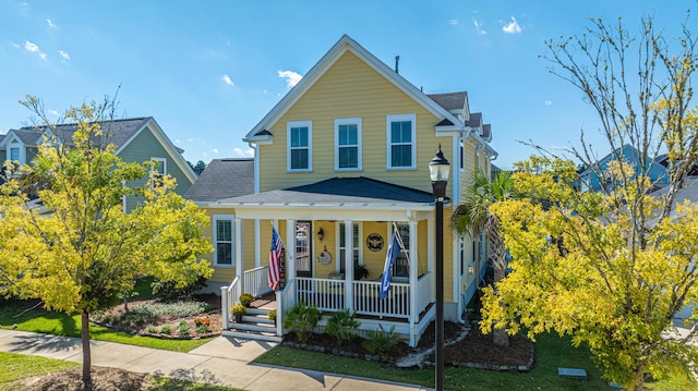 415 Watergrass Way, Summerville, SC 29485 - traditional home with a porch and a shingled roof