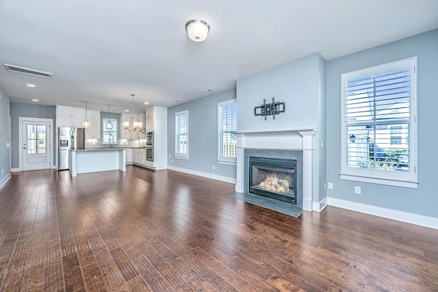 415 Watergrass Way, Summerville, SC 29485 - unfurnished living room with a high end fireplace, visible vents, recessed lighting, dark wood-style flooring, and baseboards