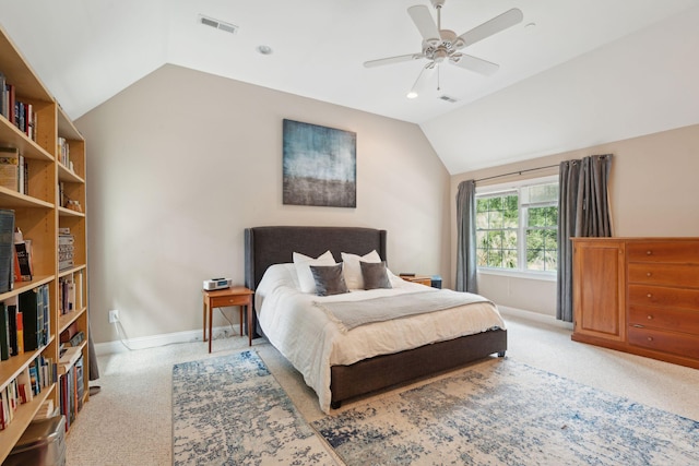 bedroom with lofted ceiling, light colored carpet, visible vents, ceiling fan, and baseboards