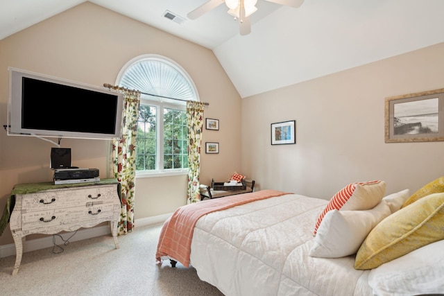 carpeted bedroom with lofted ceiling, ceiling fan, visible vents, and baseboards