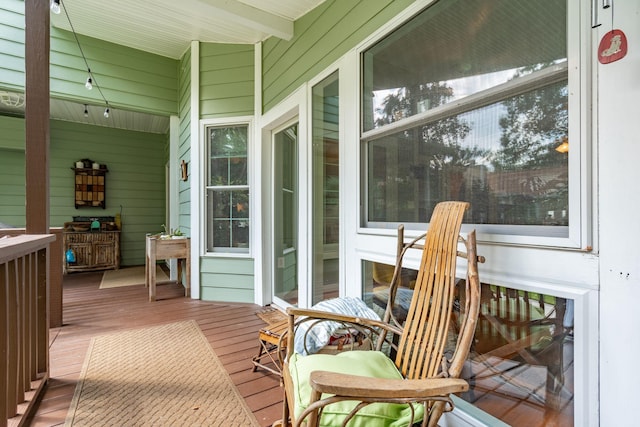 wooden terrace featuring a porch