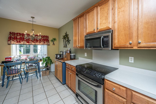 105 Northpark Ave, Summerville, SC 29485 - kitchen featuring stainless steel appliances, light tile patterned flooring, light countertops, a chandelier, and lofted ceiling