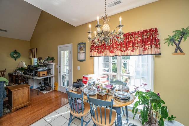 105 Northpark Ave, Summerville, SC 29485 - dining room with a chandelier, healthy amount of natural light, lofted ceiling, and tile patterned floors
