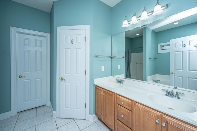 105 Northpark Ave, Summerville, SC 29485 - bathroom with a bath, tile patterned floors, double vanity, and baseboards