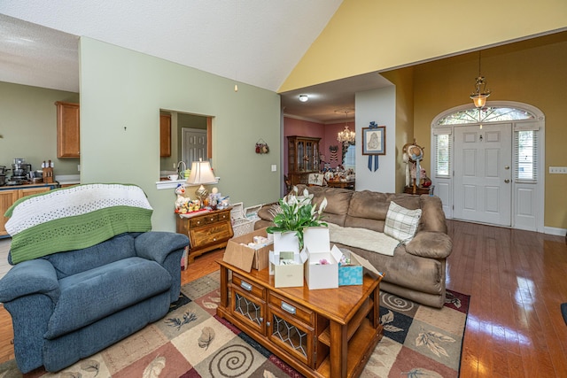 105 Northpark Ave, Summerville, SC 29485 - living area with a chandelier, vaulted ceiling, and hardwood / wood-style flooring