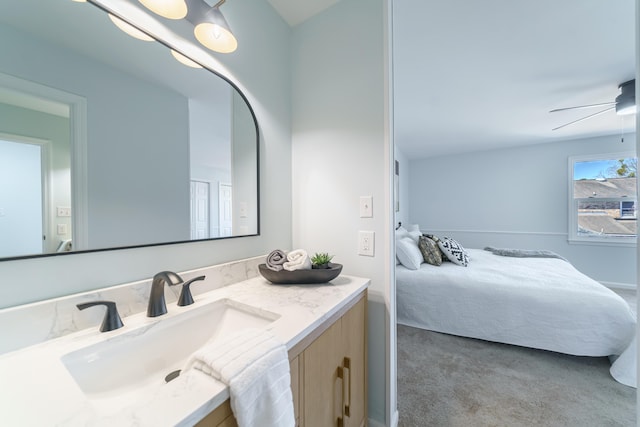 bathroom featuring vanity and ceiling fan