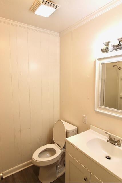 1925 Kerry St, North Charleston, SC 29406 - bathroom featuring vanity, toilet, crown molding, and wood finished floors