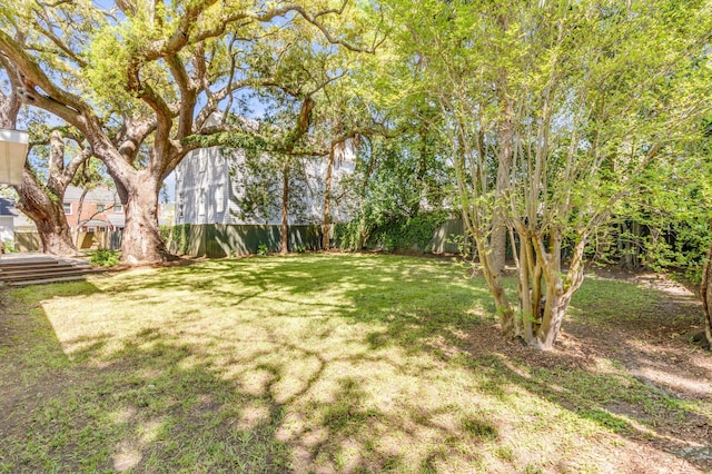 view of yard with fence