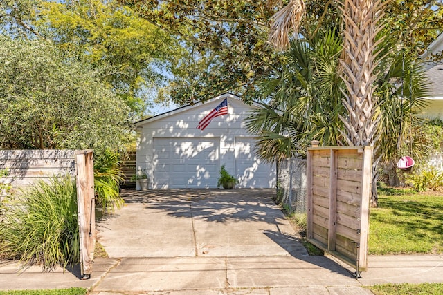 detached garage with fence