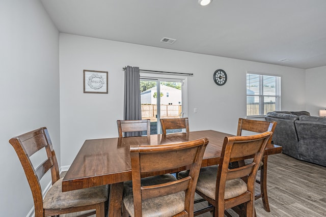 dining space featuring light hardwood / wood-style flooring