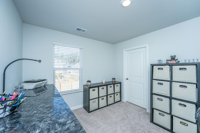 bedroom with light colored carpet