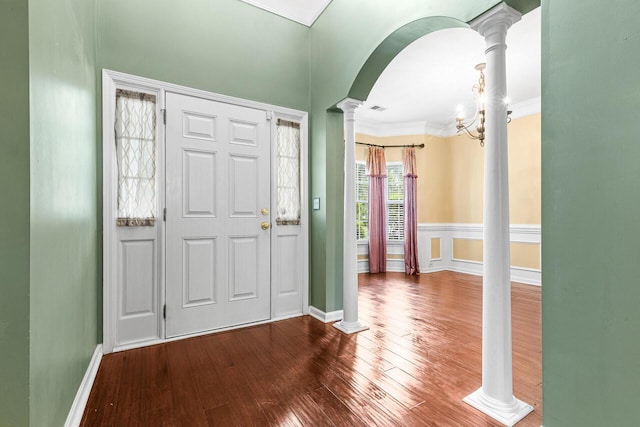 5404 Red Fork Ln, North Charleston, SC 29420 - entryway with decorative columns, wood finished floors, ornamental molding, and baseboards