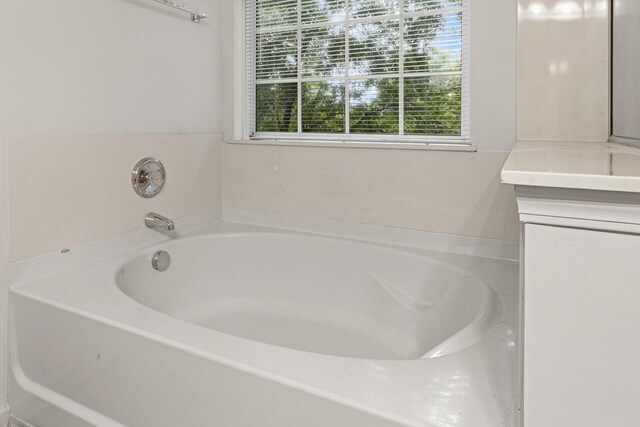 5404 Red Fork Ln, North Charleston, SC 29420 - bathroom with vanity and a garden tub