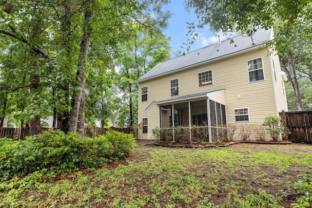 5404 Red Fork Ln, North Charleston, SC 29420 - rear view of house featuring a sunroom and a fenced backyard