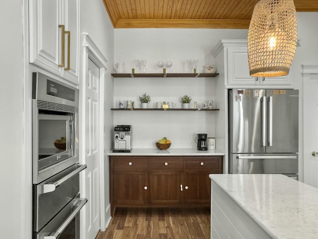 kitchen featuring wood finished floors, ornamental molding, wood ceiling, appliances with stainless steel finishes, and a notable chandelier