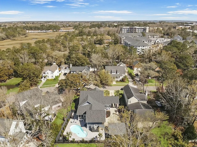 birds eye view of property with a residential view