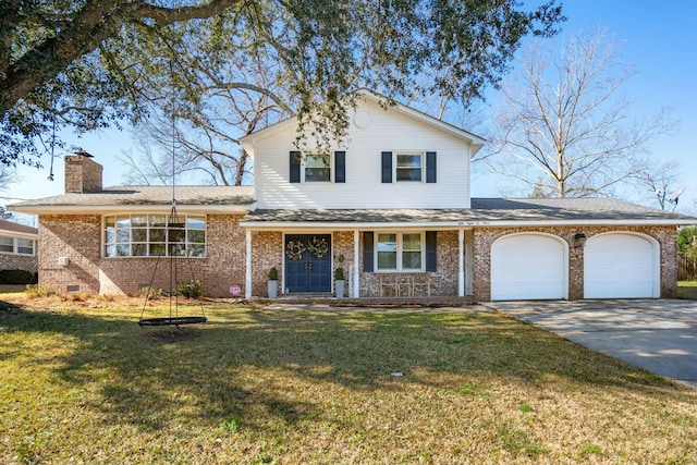 view of front of home with covered porch, a front yard, and a garage