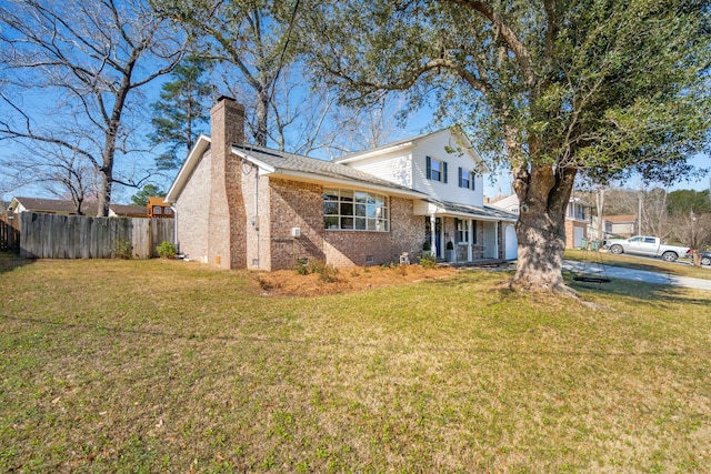 view of front facade with a front lawn