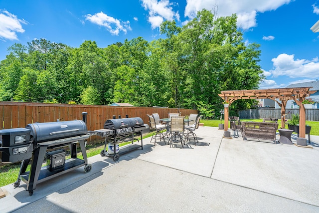 511 Nandina Dr, Goose Creek, SC 29445 - view of patio featuring a grill, a pergola, outdoor dining area, and a fenced backyard