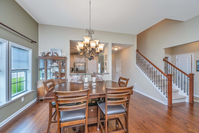 511 Nandina Dr, Goose Creek, SC 29445 - dining space with dark wood finished floors, baseboards, stairs, and a notable chandelier
